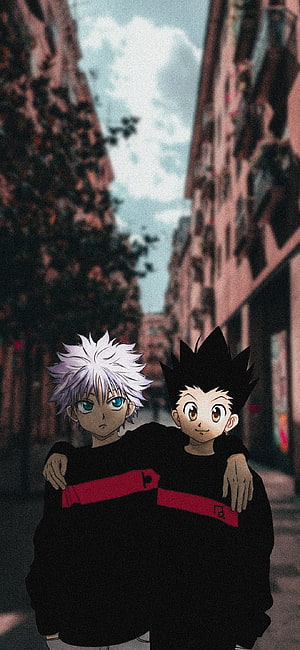 Gon and Killua from Hunter x Hunter in Matching Black Hoodies on a City Street HD phone wallpaper