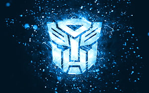 Glowing Transformers Autobot Emblem With Electric Blue Energy Particles HD wallpaper