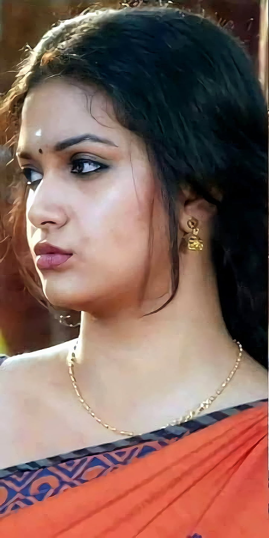 Keerthi Suresh Portrait in Traditional Orange Saree with Gold Jewelry HD phone wallpaper