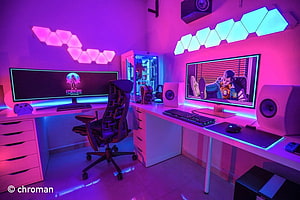 Vibrant Dual Monitor Gaming Room with Neon Hexagon Lighting and RGB PC Build HD wallpaper