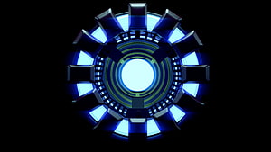 Iron Man Arc Reactor Core with Glowing Blue Energy and Metallic Housing HD wallpaper