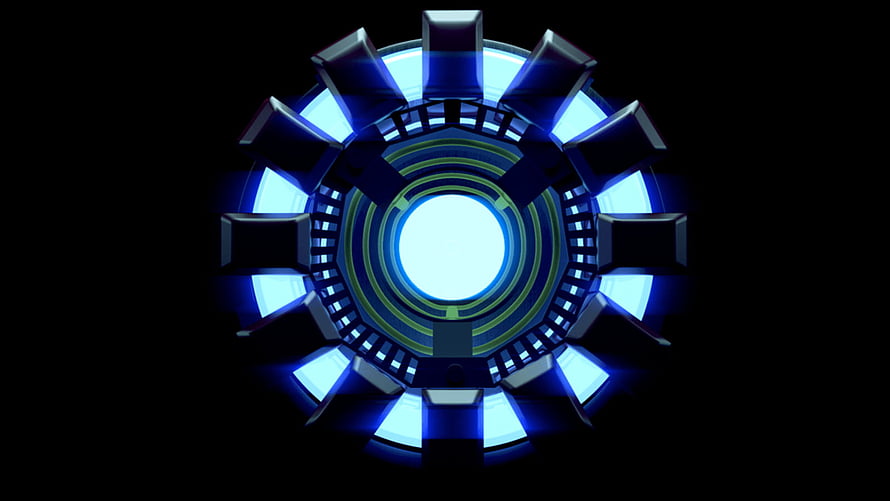 Iron Man Arc Reactor Core with Glowing Blue Energy and Metallic Housing HD wallpaper
