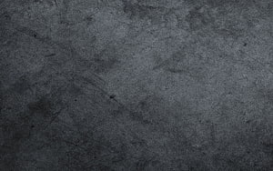 Dark Gray Concrete Texture with Subtle Stone Grain and Weathered Surface Details HD wallpaper