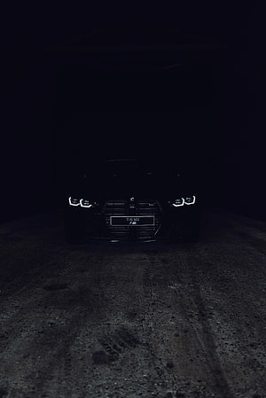 BMW M3 Front View in Darkness with Glowing Headlights and Grille HD phone wallpaper