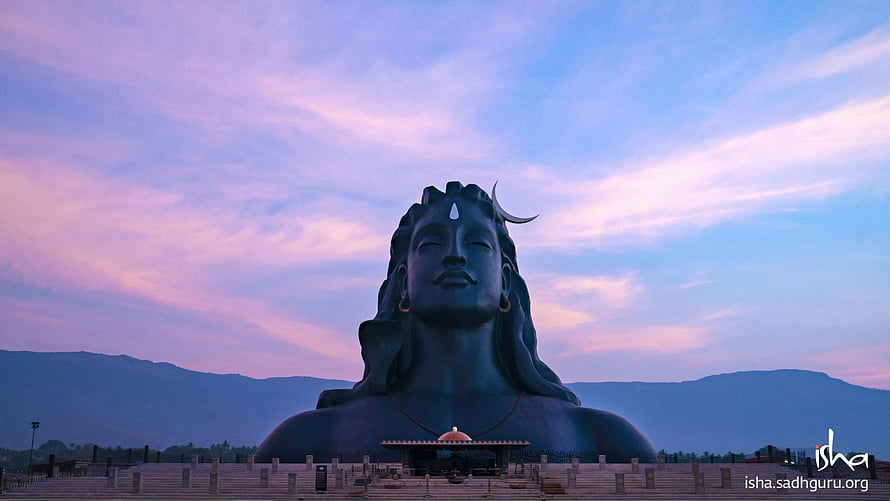 Adiyogi Statue at Isha Foundation Under a Pastel Sunset Sky HD wallpaper