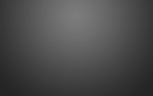 Minimalist Charcoal Gray Gradient Background with Soft Vignette and Subtle Texture HD wallpaper