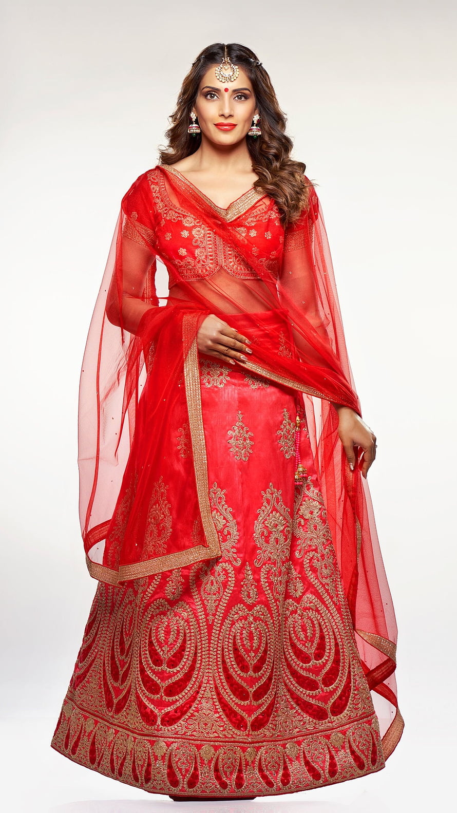 Bipasha Basu in a red embroidered lehenga with gold zari work and sheer dupatta HD phone wallpaper
