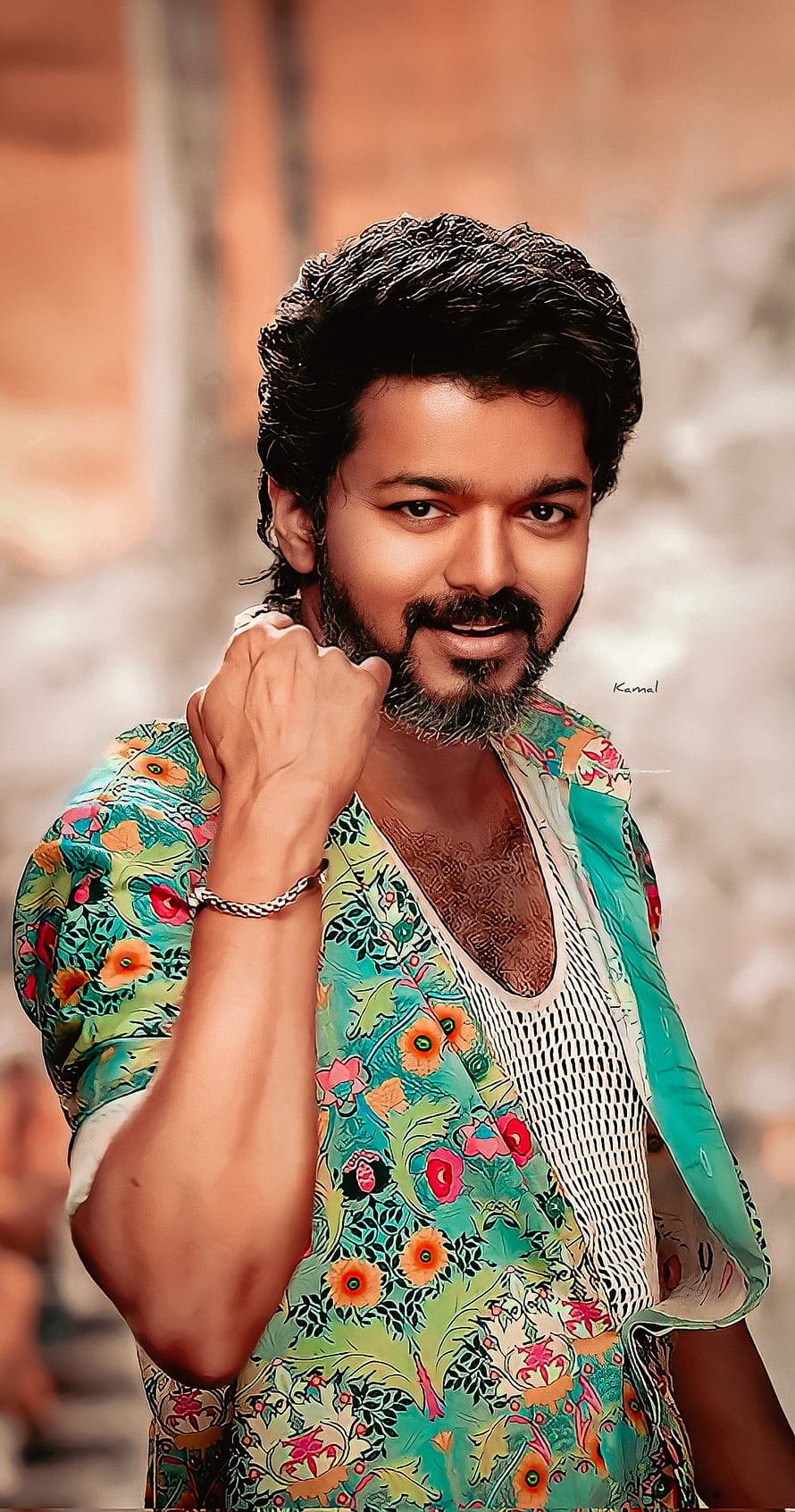 Thalapathy Vijay in a vibrant floral shirt with a confident pose and styled beard HD phone wallpaper