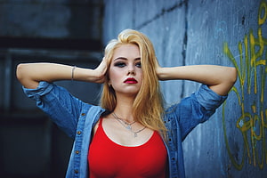 Blonde Woman in Red Top and Denim Jacket Posing Against Graffiti Wall HD wallpaper