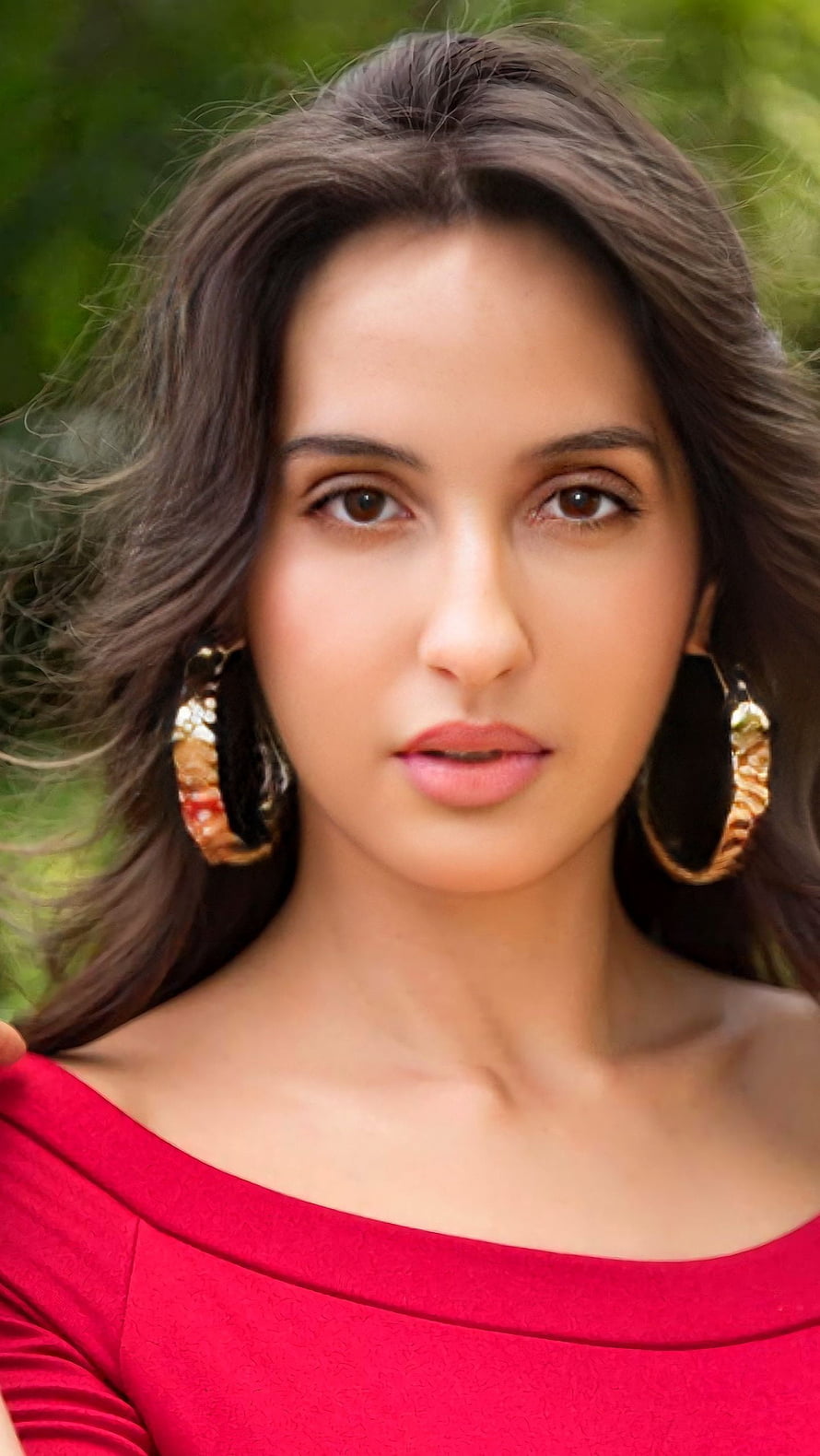 Nora Fatehi Portrait in Red Off-Shoulder Top with Gold Hoop Earrings HD phone wallpaper
