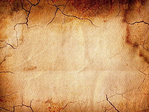 Aged Parchment Texture with Cracked Edges and Vintage Paper Background HD wallpaper