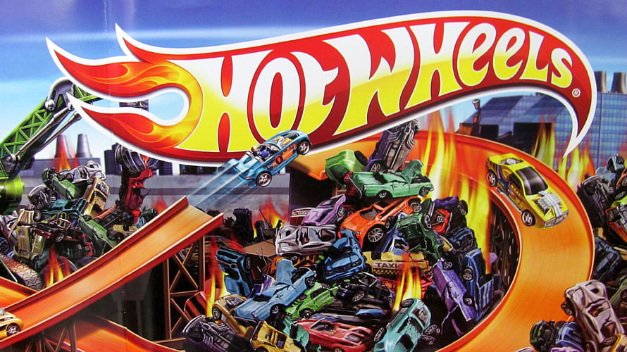 Hot Wheels Logo Over Chaotic Toy Car Crash Scene With Flames And Orange Track HD wallpaper