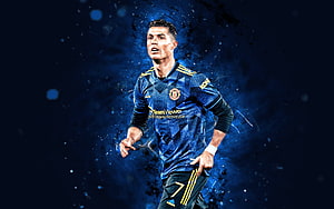 Cristiano Ronaldo in Manchester United Kit with Dynamic Blue Particle Effects HD wallpaper