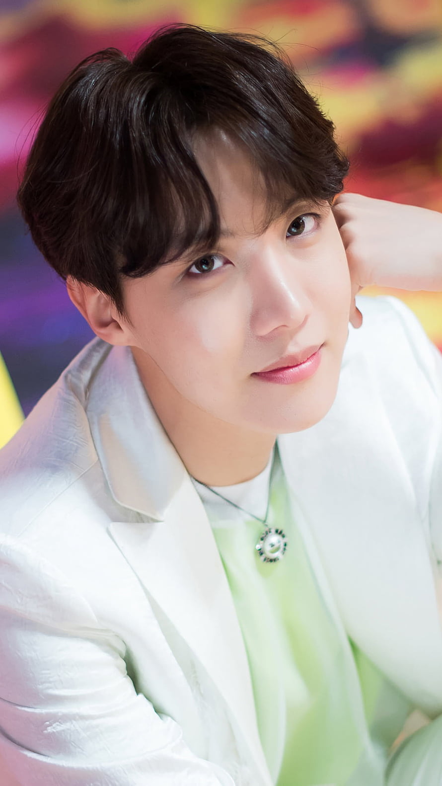 J-Hope from BTS in a white blazer and mint green shirt with a pearl pendant necklace HD phone wallpaper