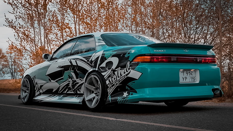 Teal Toyota Mark 2 JZX90 with Custom Graphic Wrap and Stance Setup HD wallpaper