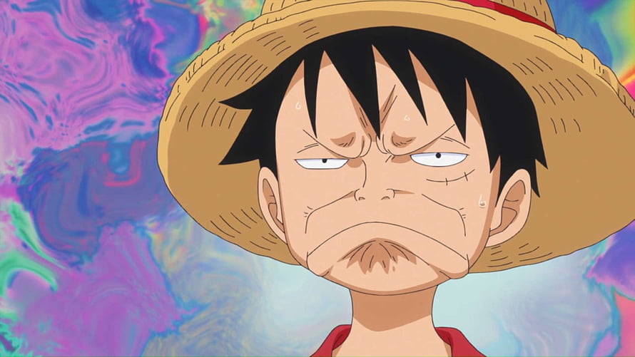 Monkey D. Luffy Intense Expression with Straw Hat Against Vibrant Abstract Background HD wallpaper