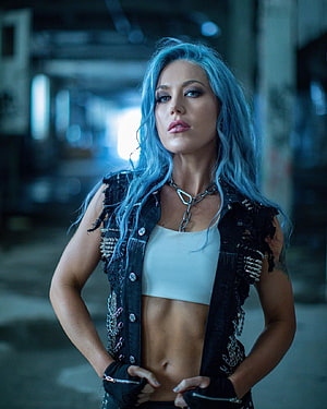 Alissa White-Gluz in distressed leather vest and white crop top with blue hair HD phone wallpaper