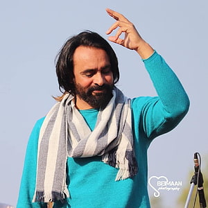 Babbu Maan in Turquoise Sweater and Striped Scarf with Hand Raised HD phone wallpaper