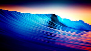 Vibrant Abstract Ocean Wave with Sunset Gradient and Motion Blur HD wallpaper