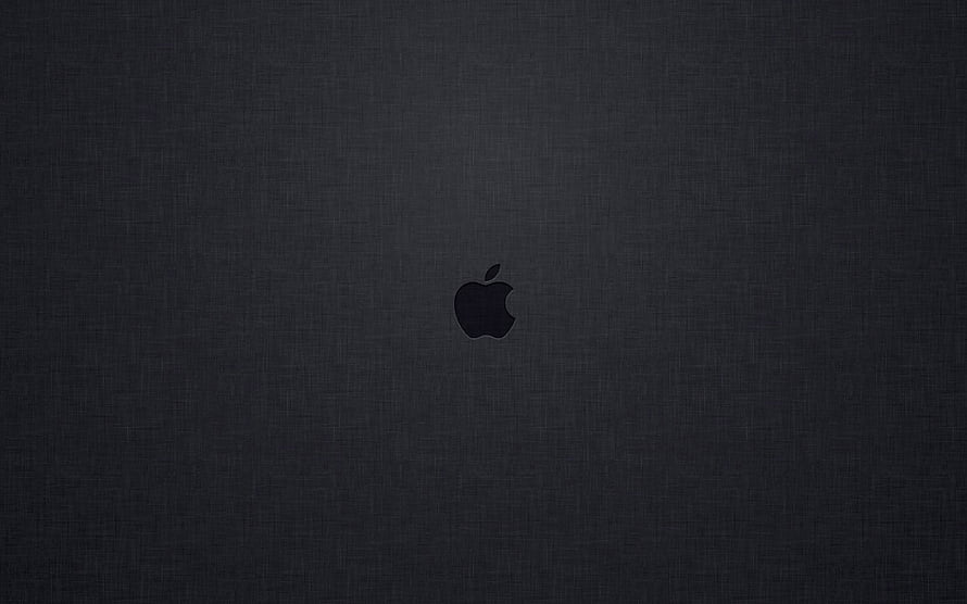 Minimalist Apple Logo on Dark Textured Surface HD wallpaper