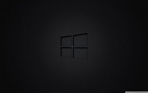 Windows 10 Black Minimalist Desktop Background with Subtle Logo HD wallpaper
