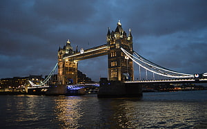 Illuminated Tower Bridge Spanning The River Thames Under A Dramatic London Night Sky HD wallpaper