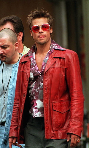Brad Pitt as Tyler Durden in Fight Club wearing a red leather jacket and sunglasses on set HD phone wallpaper