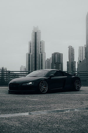 Black Audi R8 Supercar Parked on Urban Rooftop with City Skyline HD phone wallpaper