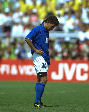 Roberto Baggio in Italy Blue Kit Standing on the Pitch with Head Down HD phone wallpaper