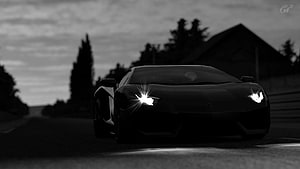 Matte Black Lamborghini Aventador Headlights On Country Road HD wallpaper