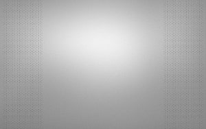 Minimalist Grey Perforated Metal Texture with Soft Central Light Gradient HD wallpaper