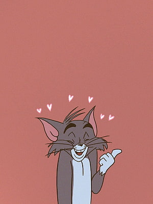 Tom from Tom and Jerry Smiling with Floating Hearts on a Dusty Rose Background HD phone wallpaper