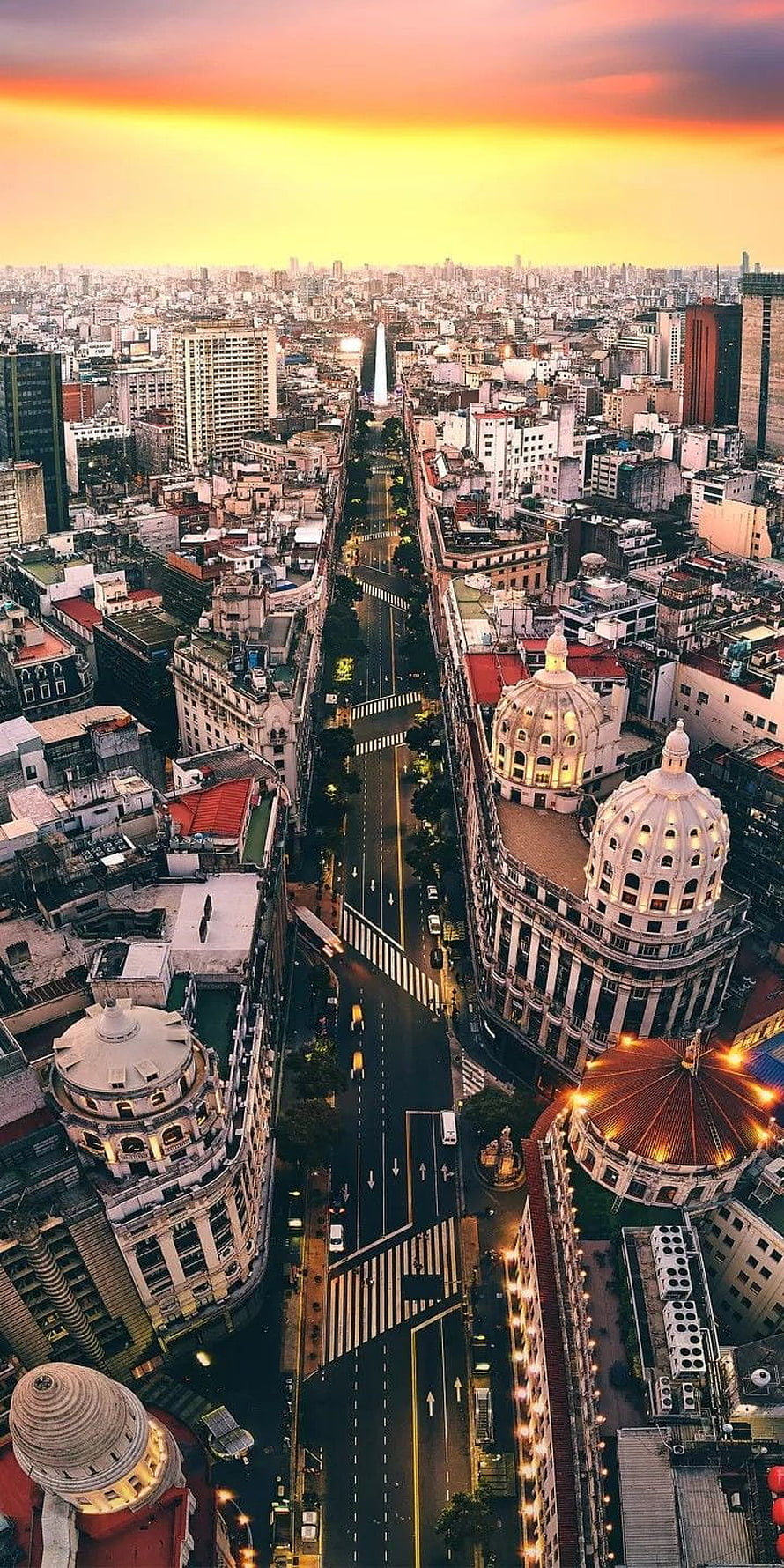 Aerial View of Buenos Aires Cityscape at Sunset with Obelisco de Mayo and Historic Domes HD phone wallpaper