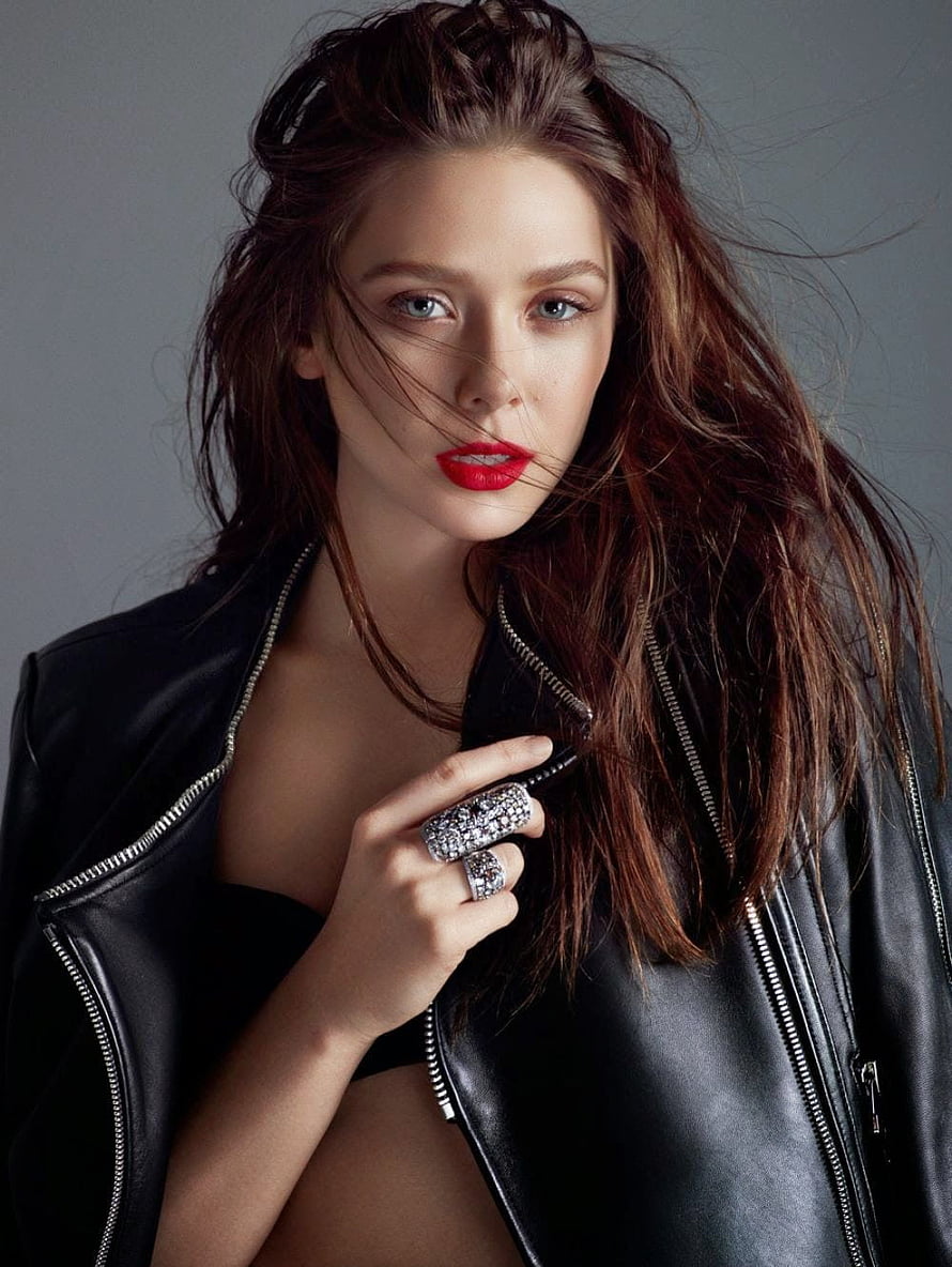 Elizabeth Olsen in Black Leather Jacket with Red Lipstick and Statement Rings HD phone wallpaper