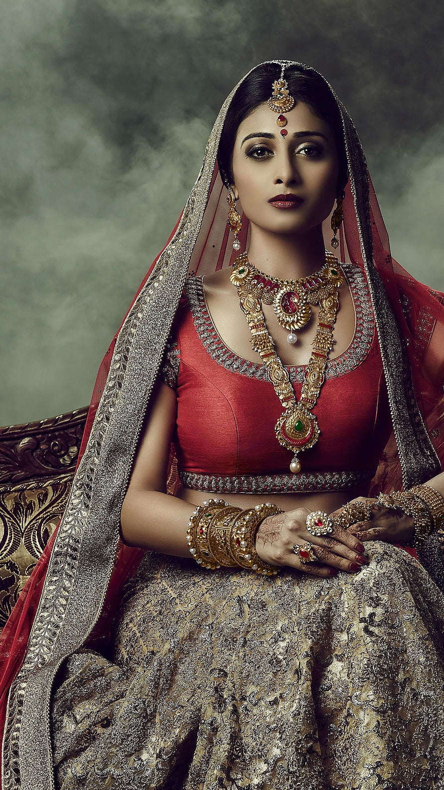 Elegant Indian Bride in Traditional Red Lehenga with Gold Jewelry and Henna HD phone wallpaper