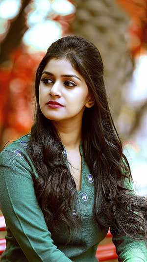 Sanjana Anand Portrait in Green Traditional Attire with Long Wavy Hair HD phone wallpaper