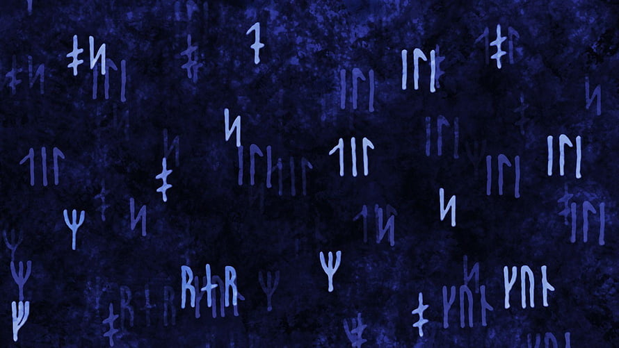 Ancient Norse Rune Carvings on Dark Textured Stone Surface HD wallpaper