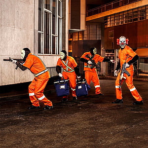 Racionais MC's album cover art featuring masked figures in orange jumpsuits with rifles and briefcases HD phone wallpaper