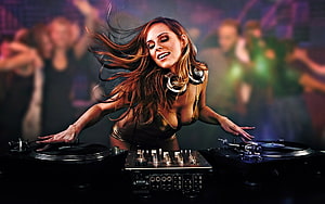 Female DJ performing at a nightclub with turntables and mixer in a vibrant party setting HD wallpaper