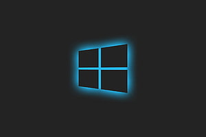 Windows 11 Glowing Blue Logo on Dark Minimalist Background HD wallpaper