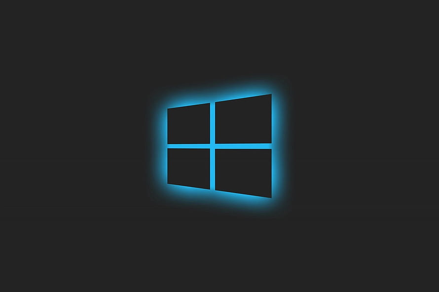 Windows 11 Glowing Blue Logo on Dark Minimalist Background HD wallpaper