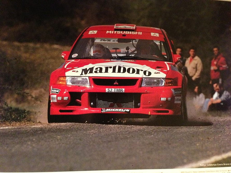 Mitsubishi Lancer Evo 6 Rally Car with Marlboro Livery on Gravel Stage HD wallpaper