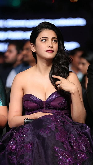 Shruti Hasan in a purple strapless gown at a Tollywood event HD phone wallpaper