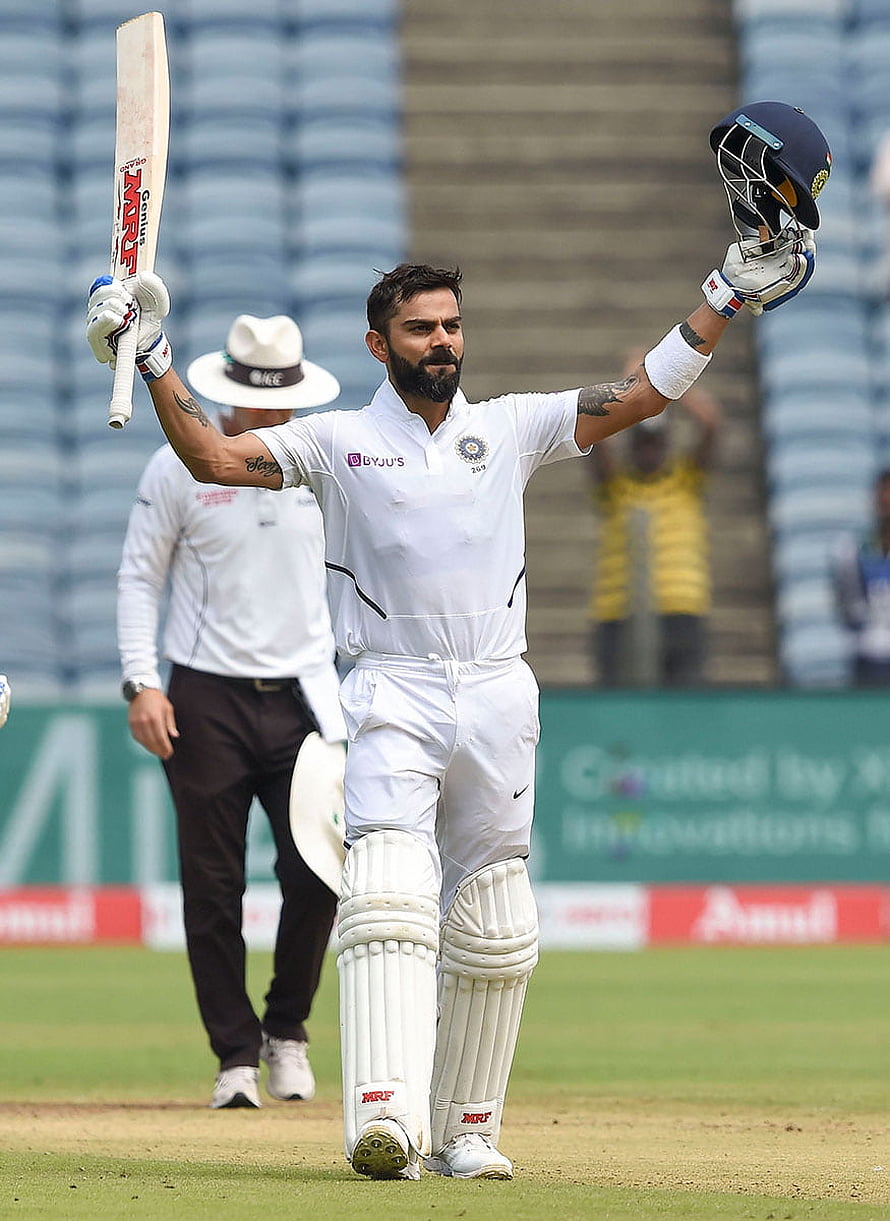 Virat Kohli Acknowledging the Crowd in White Test Cricket Gear HD phone wallpaper