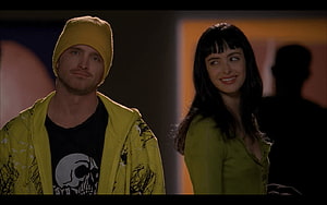 Jesse Pinkman and Jane from Breaking Bad in a dimly lit indoor scene HD wallpaper