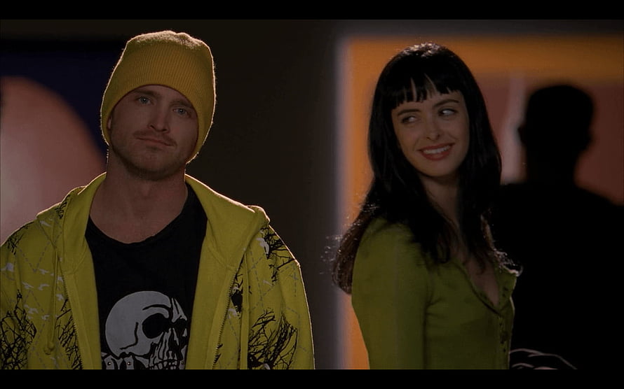 Jesse Pinkman and Jane from Breaking Bad in a dimly lit indoor scene HD wallpaper