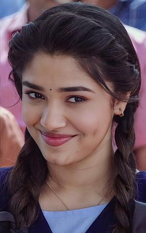 Krithi Shetty Close-Up Portrait With Braided Hair And Soft Smile HD phone wallpaper