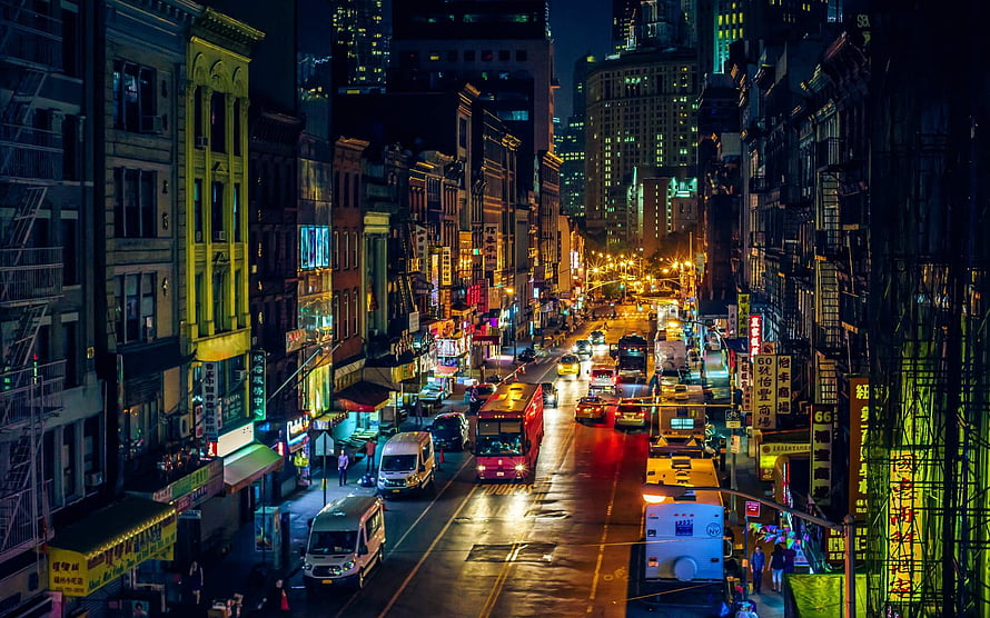 Vibrant New York City Street Scene at Night with Neon Signs and Traffic HD wallpaper