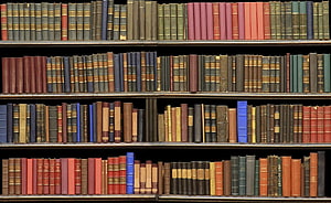Vintage Antique Library Bookshelf With Colorful Leather Bound Volumes HD wallpaper