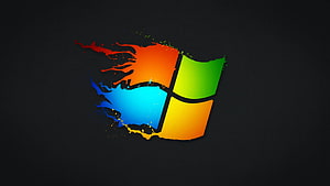 Windows 10 Logo with Glitch Art and Digital Distortion on Dark Background HD wallpaper